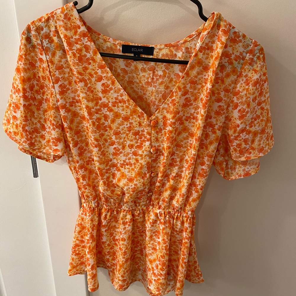Flowy orange blouse
